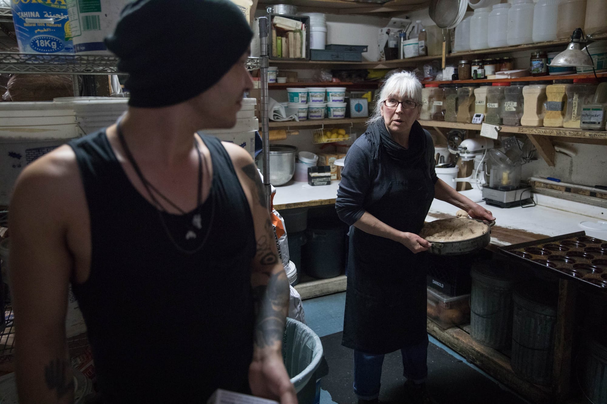 Lee talks to her youngest son and fellow employee Xavier Lee, 27, in the kitchen of Sunlight Cafe. “I used to bring him here when he was a kid. I was picking up my paycheck or sometimes sitting down for a meal,” Lee explains about the restaurant’s familial vibe. She got Xavier a son here when he was 19. “He had been coming in for years...he knew everyone.”