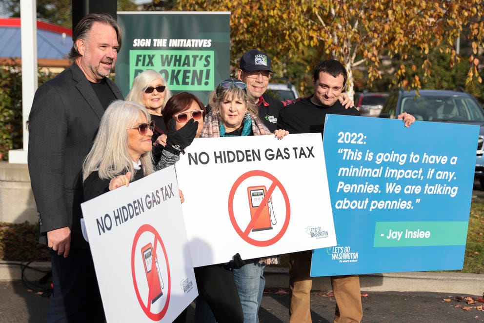 A picture of supporters gathering to support a slate of proposed initiatives to the Legislature..