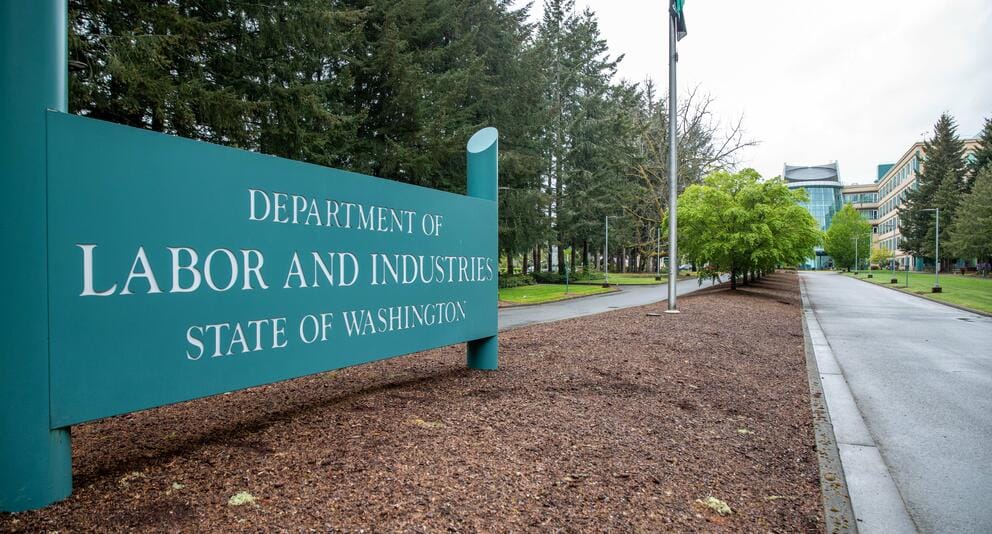 A teal sign marks the entrance to the Department of Labor & Industries